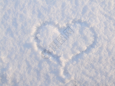 下雪时的心标志季节雪花背景图片
