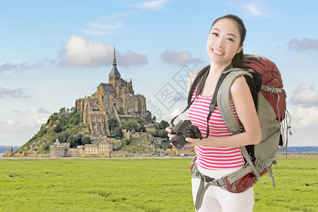 微笑旅行的亚洲女孩享受假期乘客地标喜悦快乐探险家访问游客相机亚洲人高清图片素材