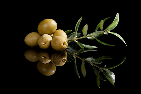 橄榄绿色橄榄背景绿色黑色烹饪食物健康水果树叶枝条背景
