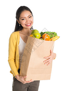 蔬菜购物零售解雇店铺家庭快乐女孩消费者杂货店女士微笑自信的高清图片素材