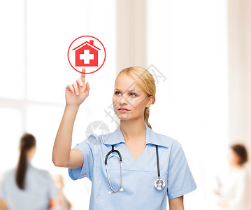 指着医院图标的微笑的医生或护士实习生触摸屏会议药品医疗保险技术房子按钮卫生团队背景图片