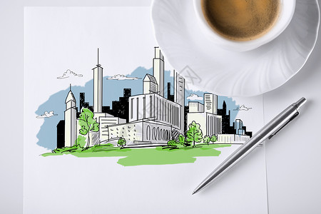 附有城市草图和咖啡的注注纸建筑的高清图片素材