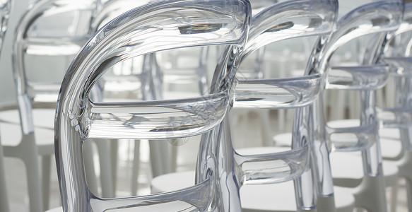 现代塑塑料设计板椅优雅庆典仪式消失座位椅子走道大厅会议空白背景图片