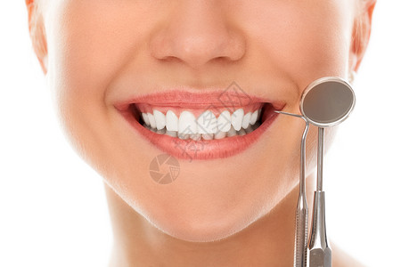 笑着看牙医药品治愈乐器衰变嘴唇愈合治疗镜子病人牙齿背景