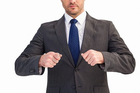 一个握紧拳头的商务人士的中间部男人男性双手套装职业人士领带商业公司商务背景图片