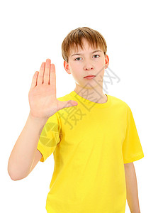 带着拒绝的手势的孩子少年时代青春期男生衬衫青少年小伙子童年棕榈信号背景图片