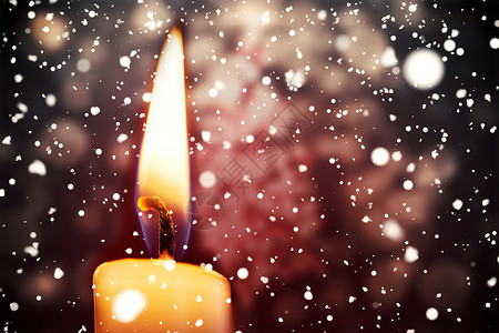 雪落在蜡烛燃烧时时候火焰假期喜庆计算机雪花下雪绘图背景图片