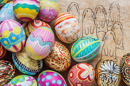 复活节兔子插图一套彩色的东方鸡蛋 配有兔子绘画假期插图艺术框架白色蓝色庆典季节绿色背景