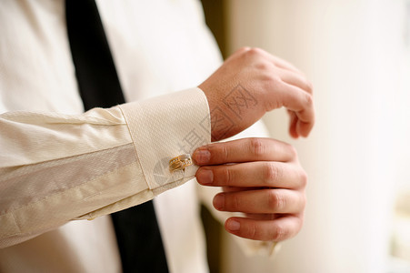 白衬衫领带男子穿白衬衫和袖扣袖口男性燕尾服商业珠宝套装衣服手腕手臂绅士背景