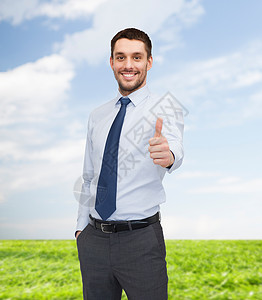 英俊的商务人士举起大拇指领带工作幸福手势男性企业家办公室男人老板商业蓝色的高清图片素材