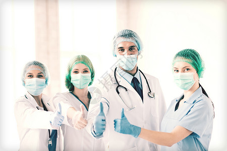 手术室内一组医生人数帽子长袍操作保健卫生房间学生护士蓝色医务人员外科医生高清图片素材
