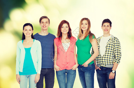 一群微笑的学生站立起来团体同学青年生态男孩们团队学校班级学者女孩们背景图片
