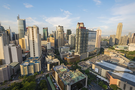 黎牙石比菲律宾大马尼拉大马尼拉园景银行交易摩托车建筑学日落村庄大都会土地城市背景