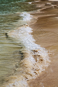 河中金子的提陆汉湾抽象旅行海岸线气泡假期阴影旅游液体石头海浪海滩背景图片