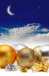 星星和圣诞球金银和银银的圣诞球星星卡片季节传统金子季节性新年月亮假期天空背景