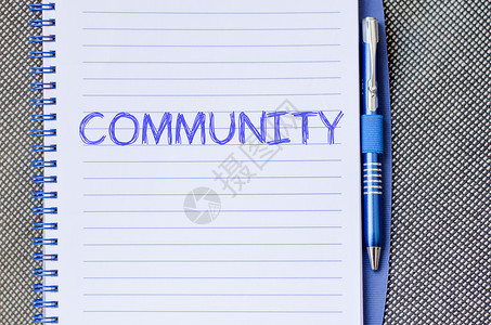 社区在笔记本上写字合伙邻里服务宽慰志愿者标签工作商业帮助成人爱高清图片素材
