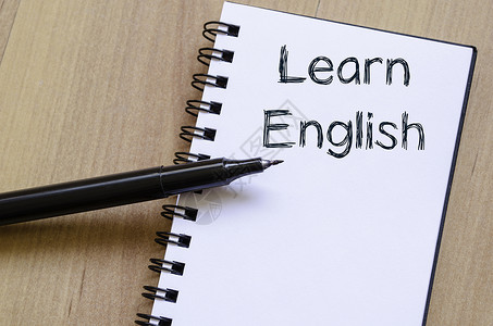 在笔记本上学习英文写作教学学校翻译教育国际英语说话训练知识语言电子学习高清图片素材