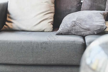 灰色的室外坐垫沙发上的坐垫装饰宏观家具家居房子灰色风格棉布亚麻客厅背景