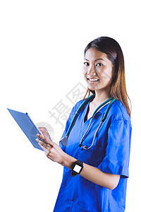 使用平板药片的亚洲护士智能女士滚动屏幕女性实习生卫生保健职业快乐电脑高清图片素材