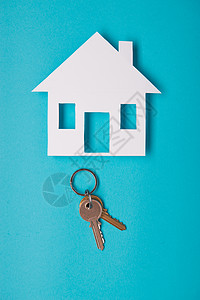 带有房屋图形的银键钥匙销售家庭投资合同房子公寓桌子安全经纪人背景图片