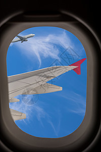 透过窗户看飞行时透过飞机窗口查看( T)背景
