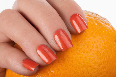 橙色指甲油创造力美学手指凝胶指甲广告背景图片