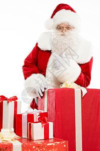 圣诞老人 带着一堆圣诞礼物庆典白色红色节日背景图片