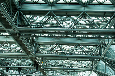 百货公司钢结构框架特写天花板商业建筑房子金属窗户材料天空光束仓库建造高清图片素材