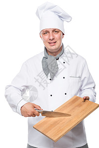 射波刀成功的男厨师 刀具和剪切板与孤立的波特拉背景