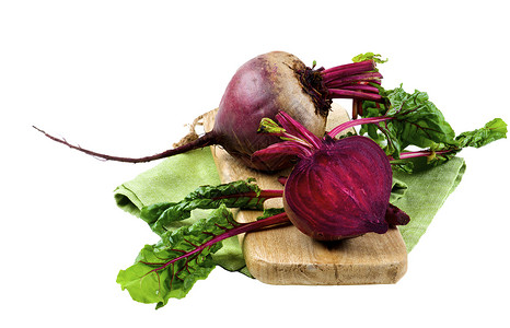 紫色甜菜头切片新鲜青菜紫色植物菜类餐巾健康饮食饮食叶子农场素食砧板背景
