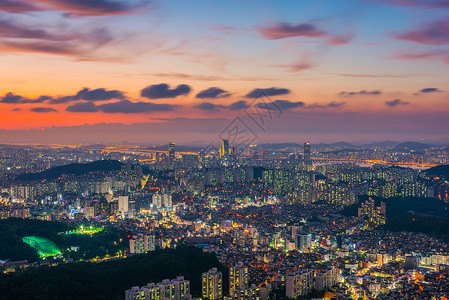 韩国 晚上在汉城 南韩城市的天线办公室建筑物日落场景商业旅行景观市中心风景地标塔高清图片素材