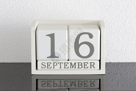 白区块日历目前日期 9月16日和11日白色历史节日派对框架反射黑色死亡会议假期背景图片