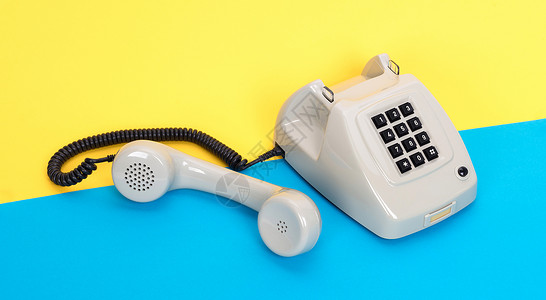旧灰色电话办公室黄色桌子黑色商业拨号服务台帮助讲话蓝色标头高清图片素材
