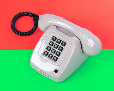 旧灰色电话帮助桌子讲话办公室红色耳机黑色电缆渲染拨号丰富多彩的高清图片素材