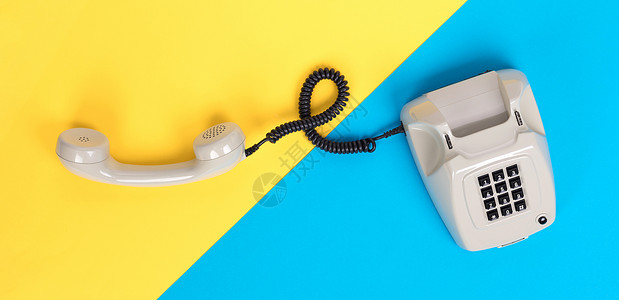 旧灰色电话商业桌子黑色手机服务台黄色帮助蓝色绳索渲染蓝色的高清图片素材