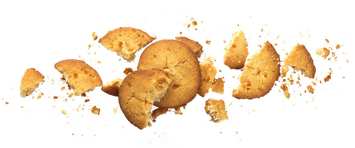 白色背景上孤立的断裂燕麦饼干飞行芯片面包屑圆形收藏包装谷物食物美食小麦背景图片
