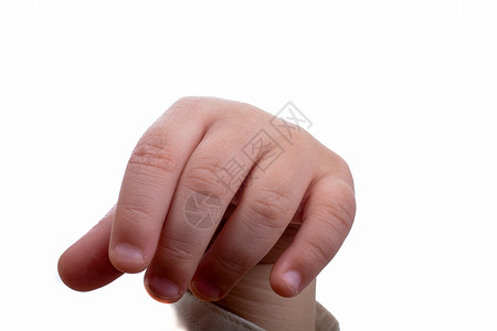 婴儿的手居住指甲拇指手指棕榈背景图片