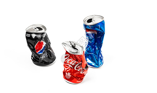 Pepsi和Cola 铝罐的空虚 坠毁的照片高清图片