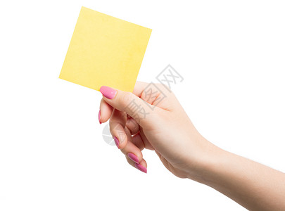 手持空白黄纸纸纸的妇女邮政备忘录女士软垫写作数据会议框架手势白色背景图片