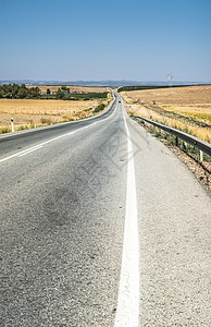 长沥青路速度森林驾驶乡村绿色天空沥青蓝色国家地平线运输高清图片素材