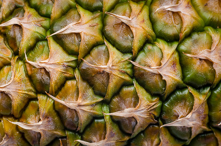成熟菠萝外皮的宏观闭合背景图片
