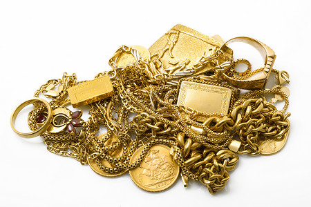 白色背景的金色对象宝藏金条硬币宝石黄色链子危机概念金子手表背景图片