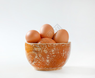 新鲜棕褐蛋鸡蛋团体食物棕色背景图片