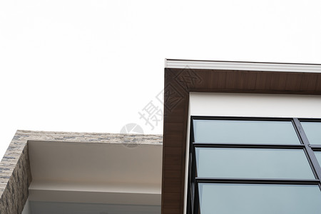 现代公寓大楼的窗户在阴云天外面天空金融商业生长职场市中心财产建筑学办公室建筑背景高清图片素材