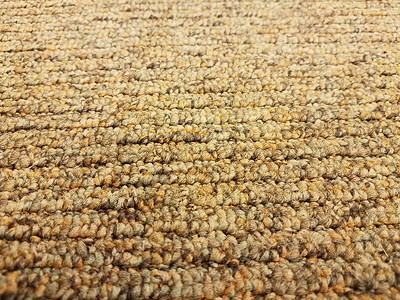 黄褐的 黄黄色的毯子 或紧近的纤维纺织品棕色小地毯地面橙子背景图片