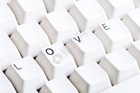 计算机键盘上的 Word 爱与其他按钮上的空白空间 可用作互联网上爱情的象征 爱情电子邮件信件技术白色电子网络电脑互联网背景图片