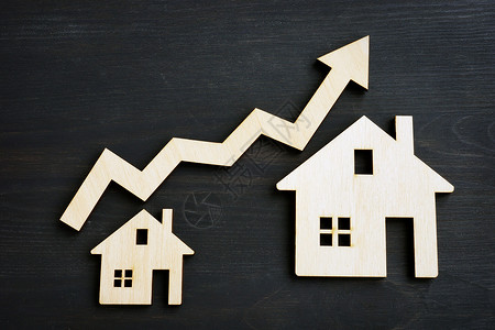 地产投资 房子和箭的模型背景图片