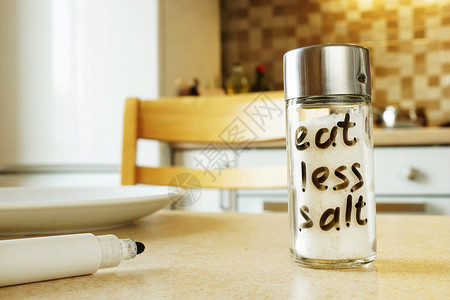 在玻璃容器上少吃点盐背景图片