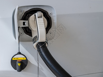 中国电动车辆充电车加油站背景图片