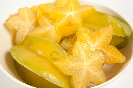 恒星水果或卡兰波拉食物黄色异国白色营养叶子工作室药品饮食星星背景